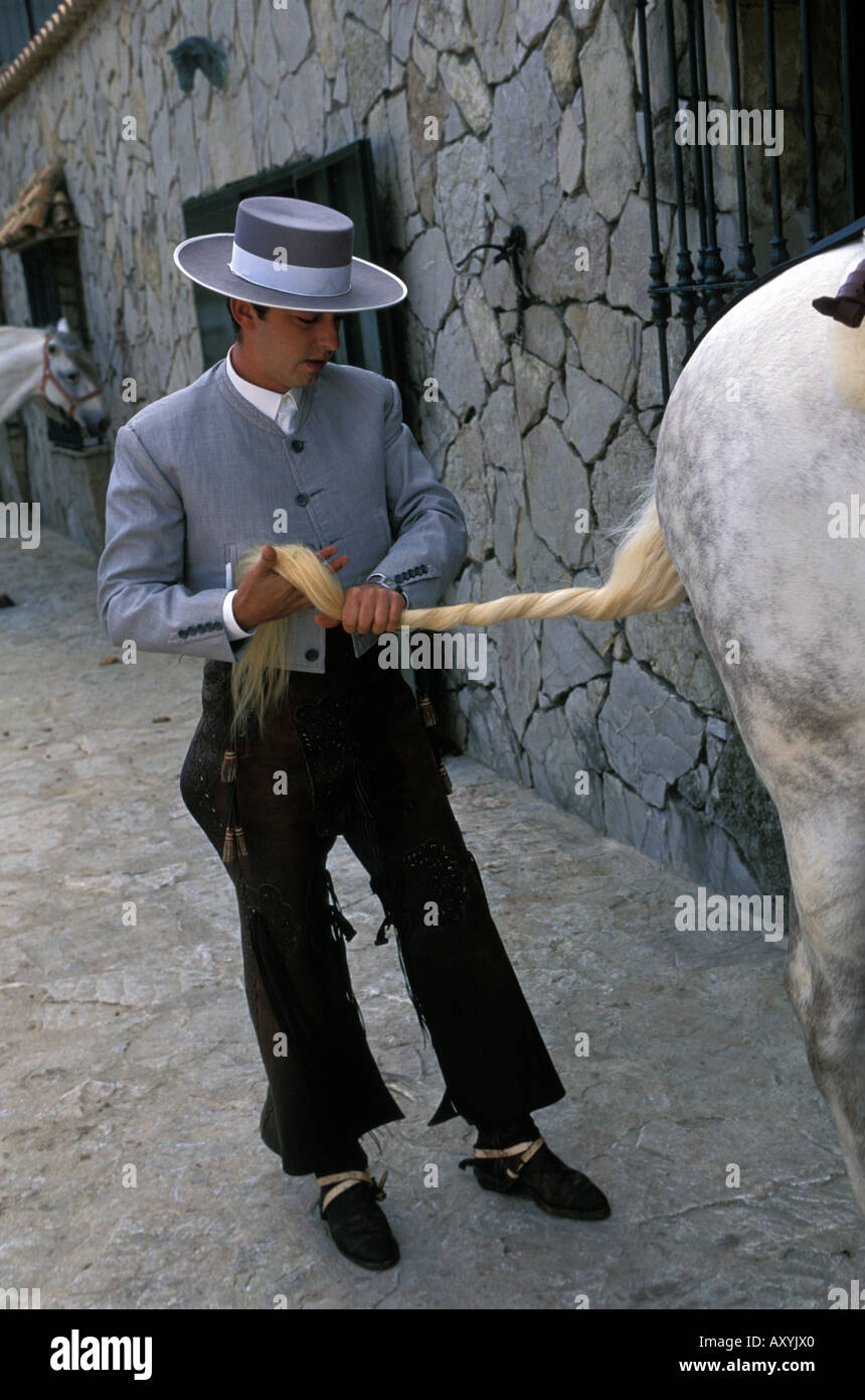Tarifa a Spanish cowboy preparing his horse Stock Photo - Alamy