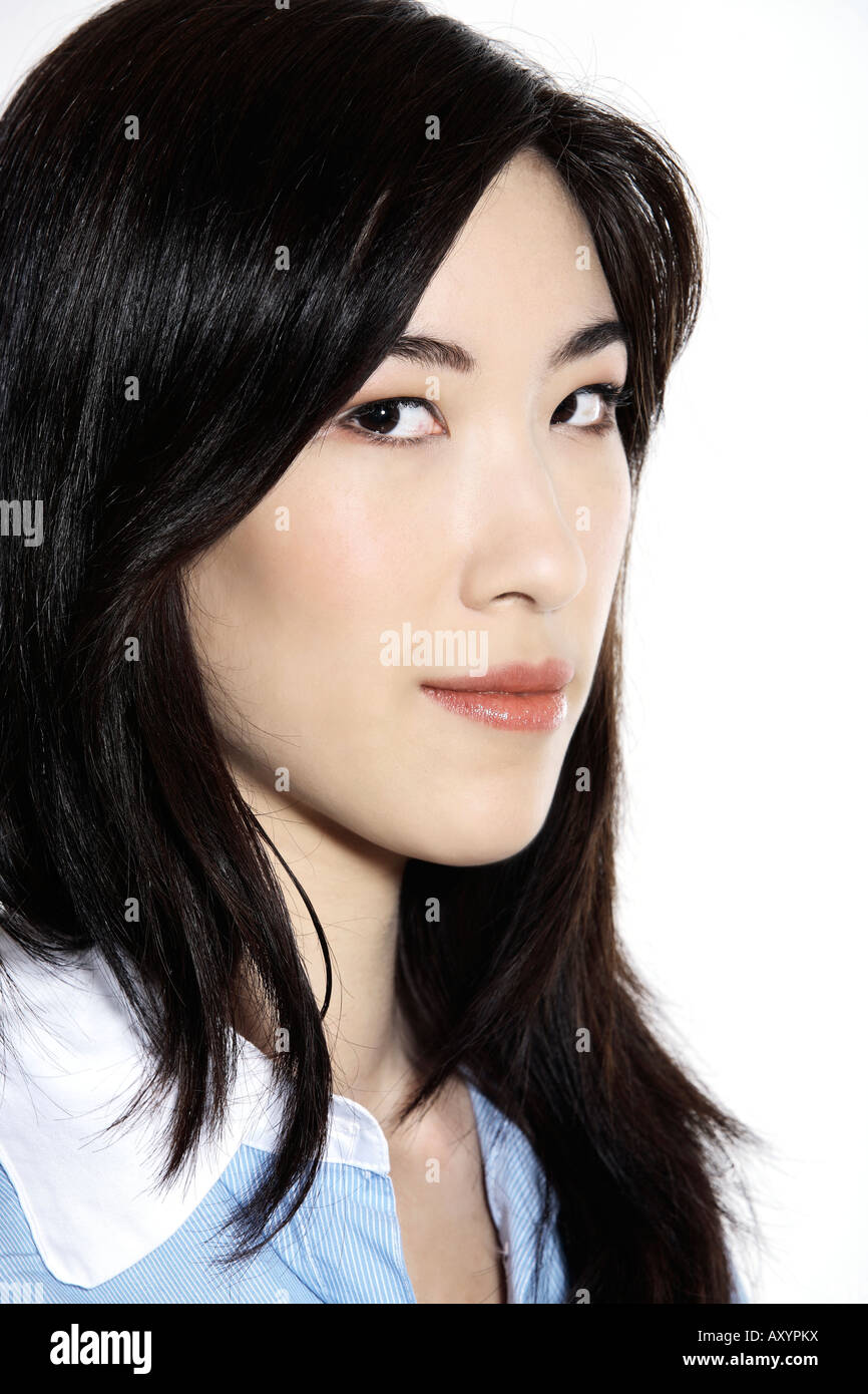 studio shot isolated portrait of a young cute smiling asian woman Stock ...