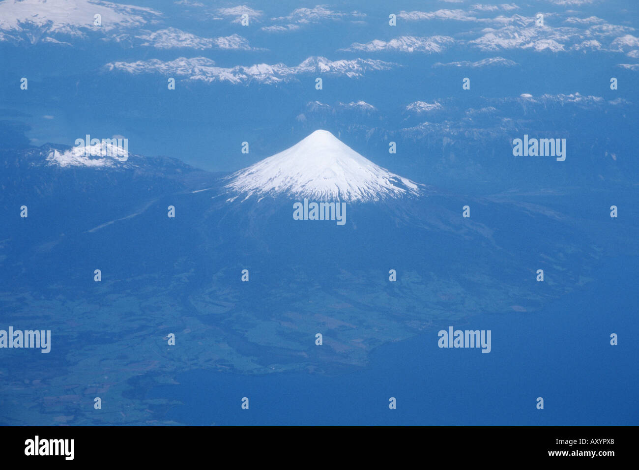 aerial photo of the snow covered Villarica volcano, Chile, La Araucaria, Villarica Stock Photo