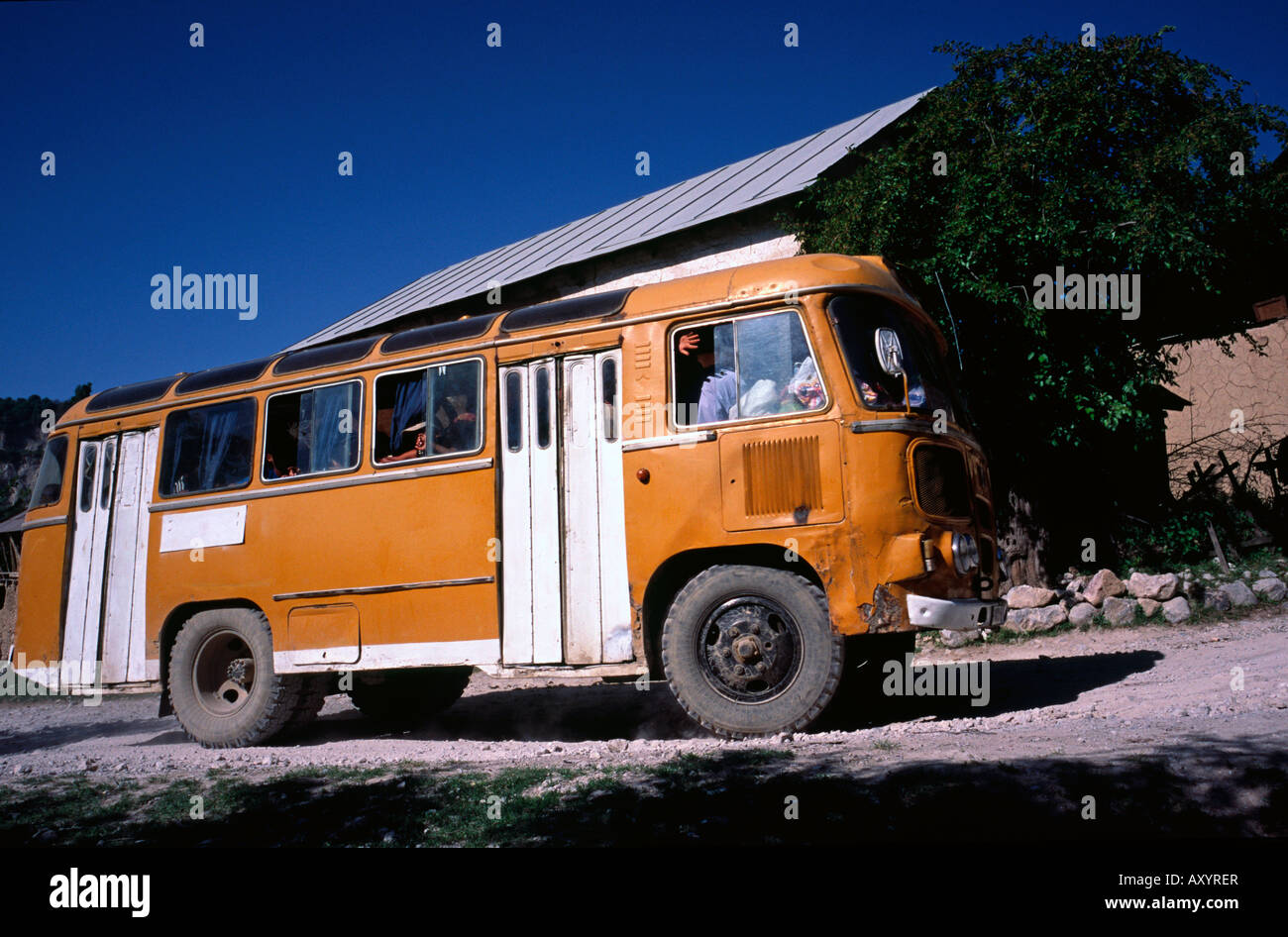 June 7, 2006 - Local bus making its way through the Kyrgyz mountain village of Arslanbop. Stock Photo