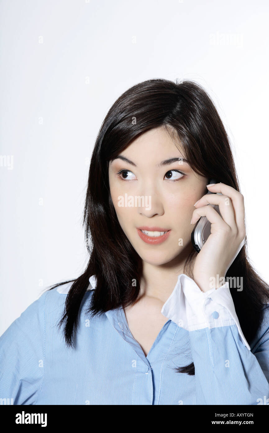 studio shot isolated portrait of a young cute smiling asian woman Stock ...