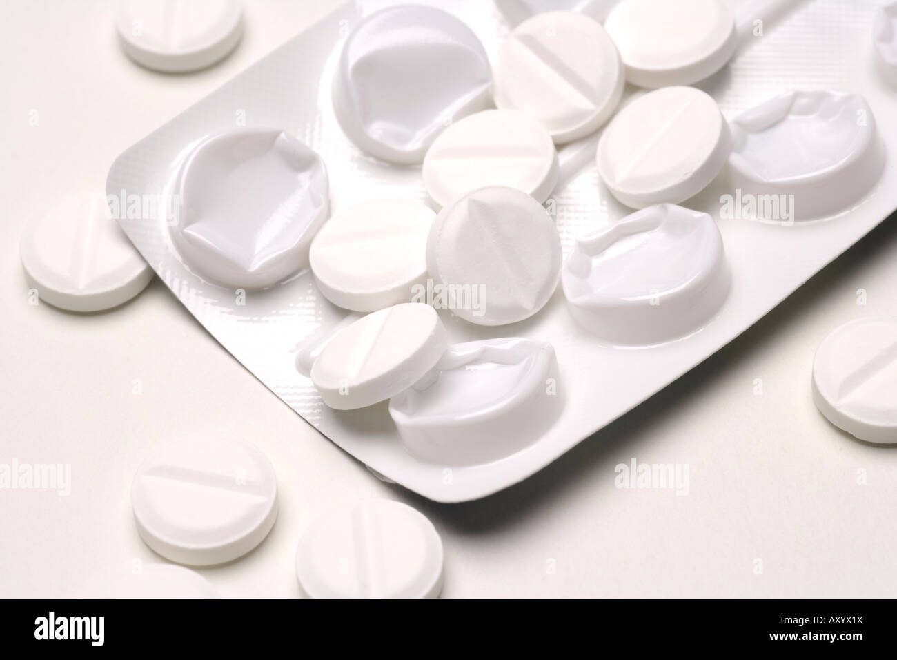 Medicine packaging tablets pills drugs and a blister pack healthcare aspirin or paracetamol Stock Photo