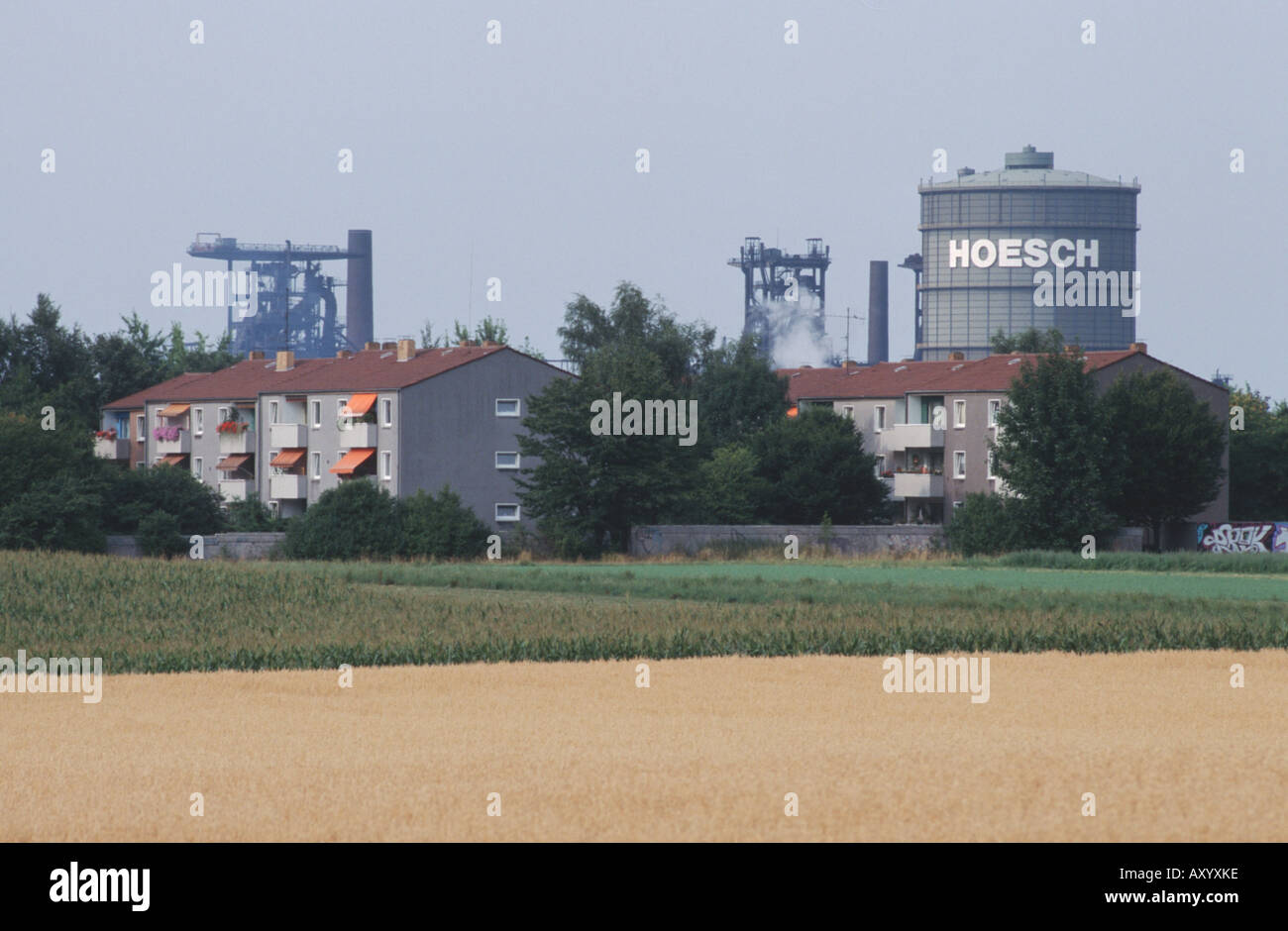 Appartment blocks in front of an industrial site, Germany, North Rhine-Westphalia, Ruhr Area, Dortmund Stock Photo