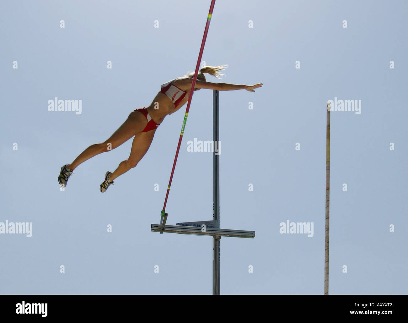 motionsequence pole vault, athlete jumping over the bar Stock Photo Alamy