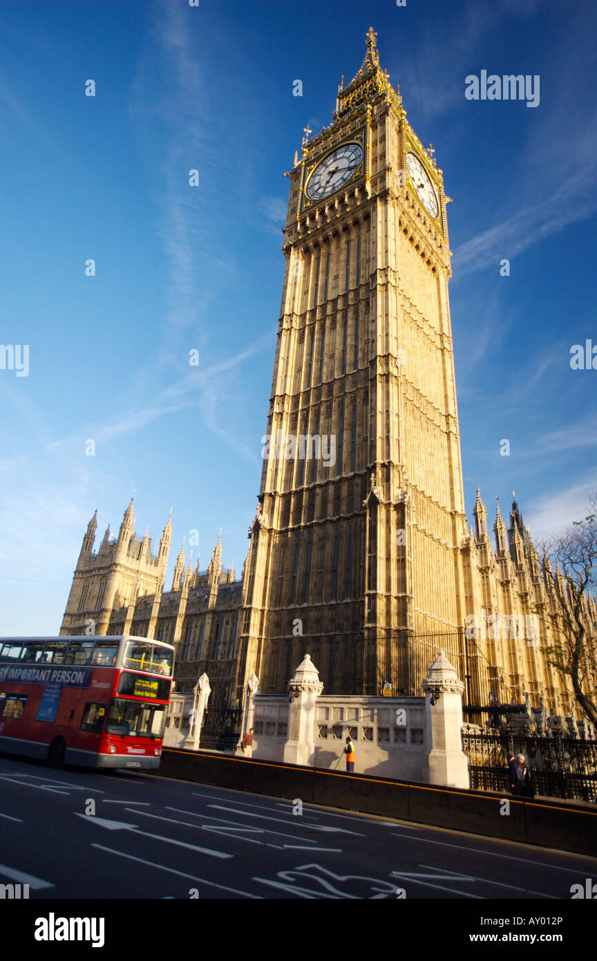 Big Ben clock tower with bus passing by Stock Photo