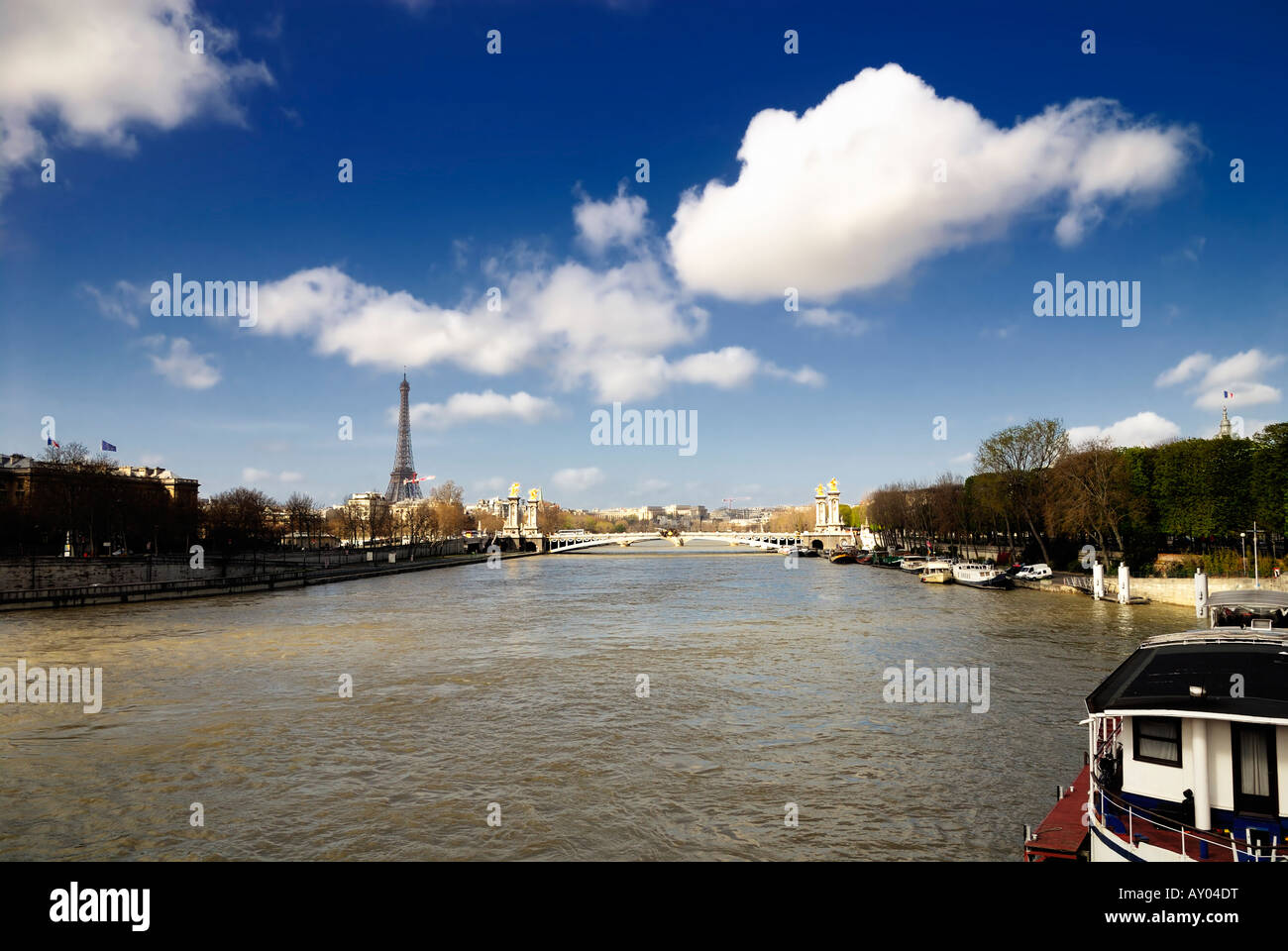 Taken from the Pont de la Concorde towards the Pont Alexandre ll and the Eiffel tower in Paris, Europe. Stock Photo