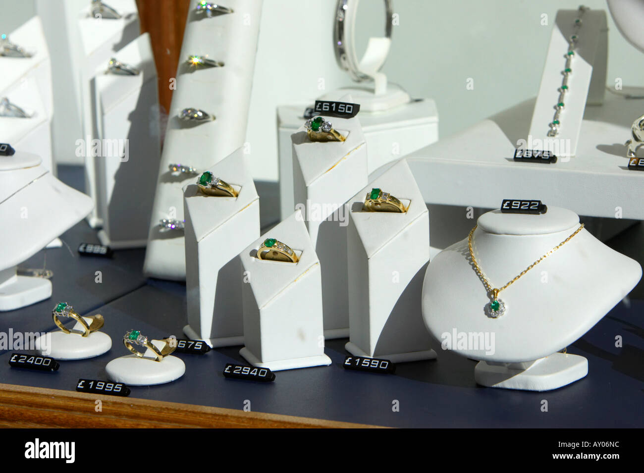 selection of rings and jewelry with prices in exclusive shop window in