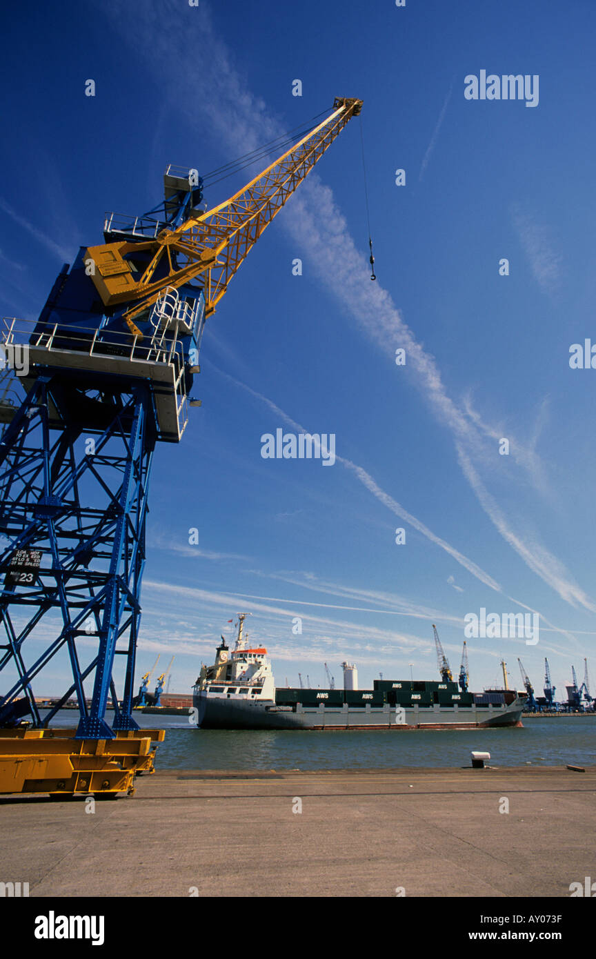 freighter passing giant crane on quayside at the port of hull yorkshire