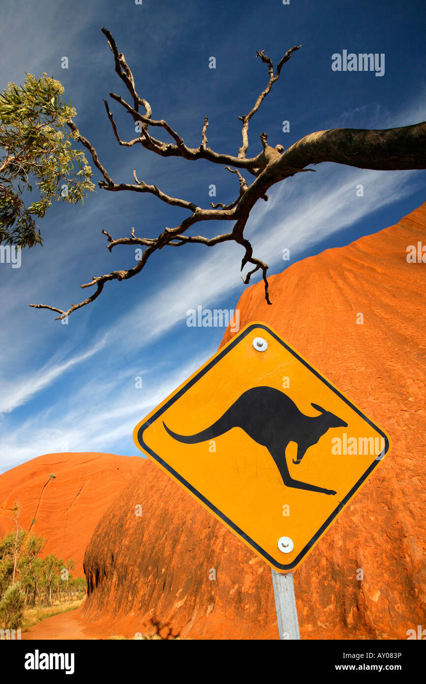Uluru / Ayer's Rock with Iconic Kangaroo Sign Stock Photo