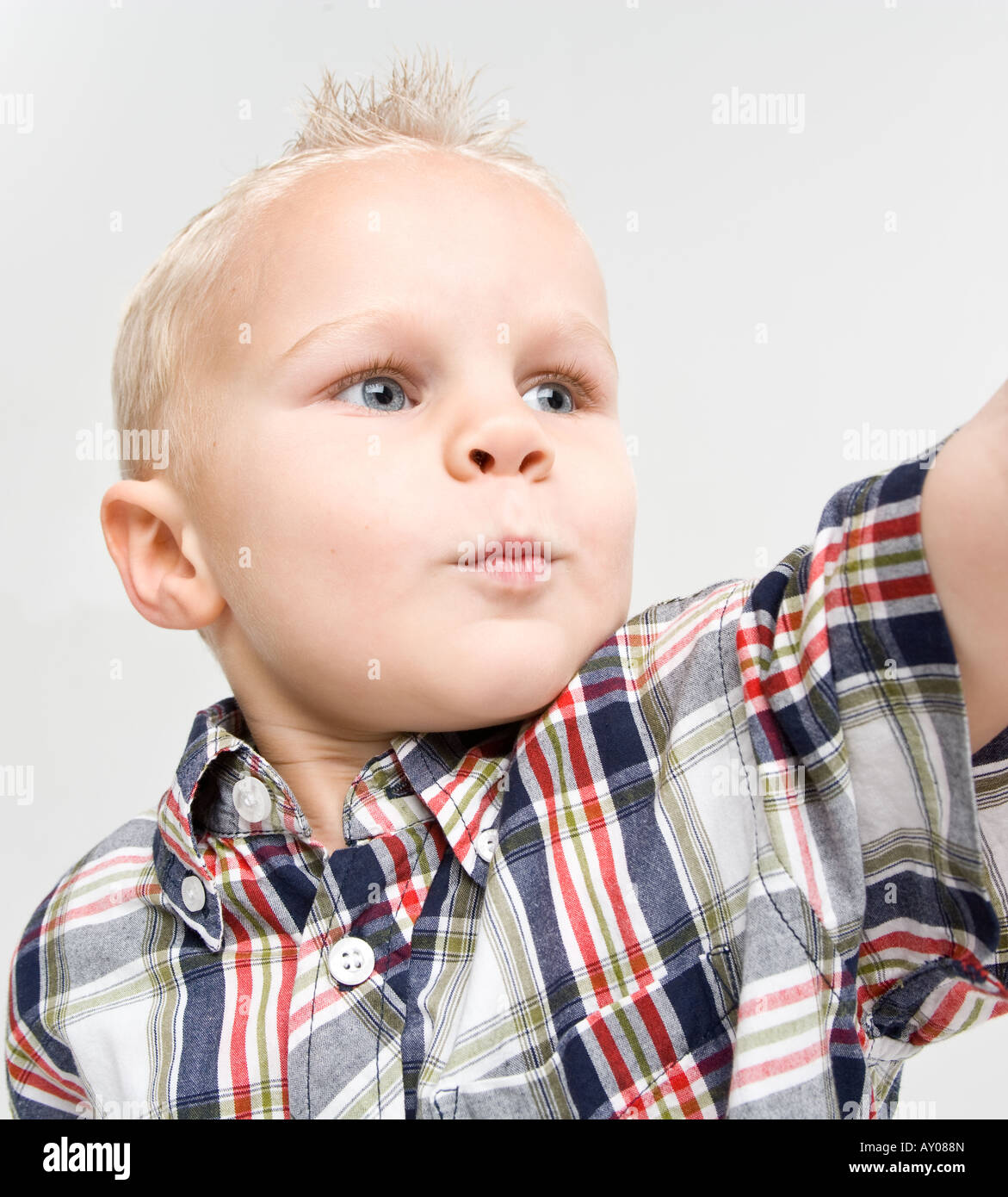 Small Boy Pointing Out Over There Stock Photo Alamy