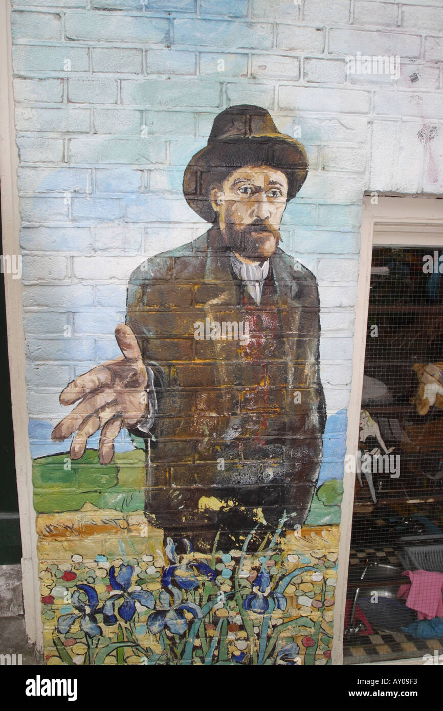 Vincent Van Gogh a wall mural of Vincent Van Gogh on a canal side house