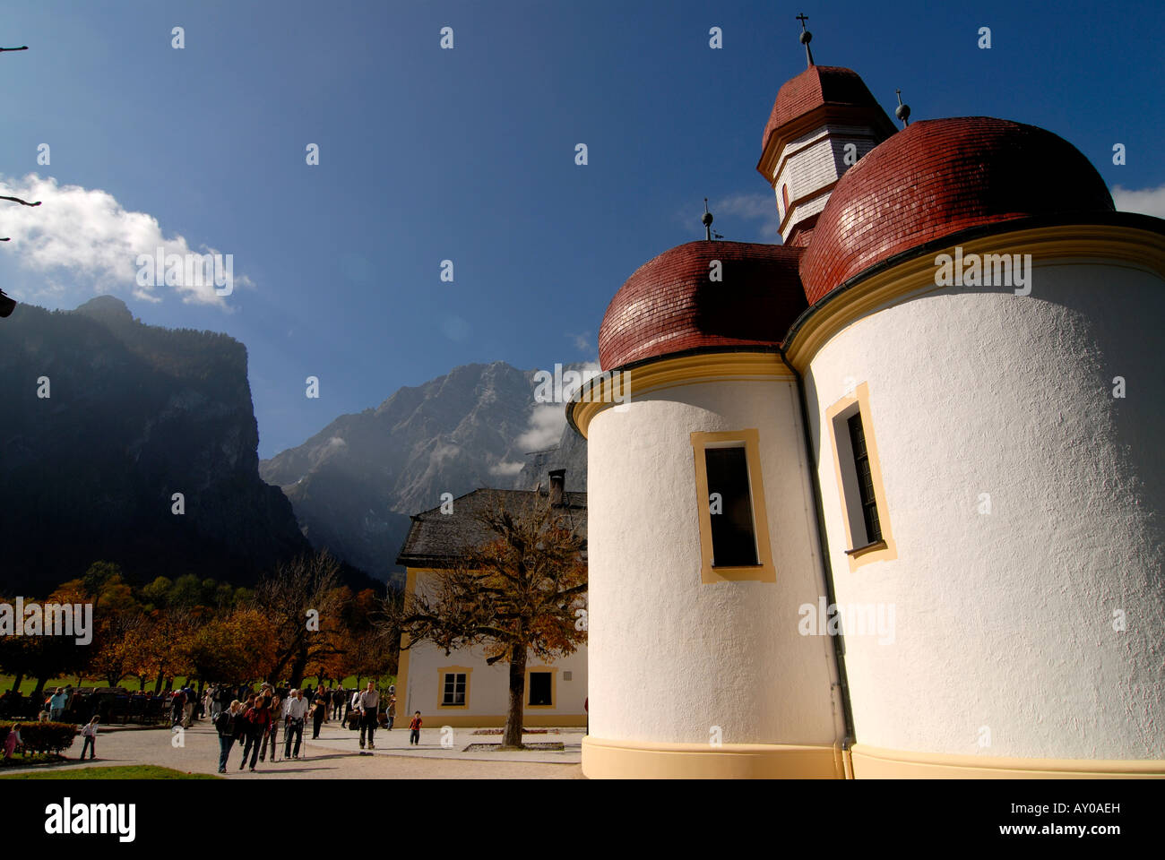 The very famous St Bartholomä church on the Königssee in the background the Watzman Berchtesgadener land National park Bavaria G Stock Photo