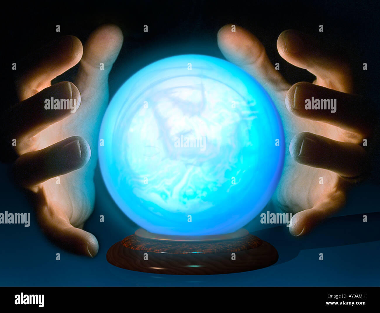 Hands with glowing crystal ball Stock Photo Alamy
