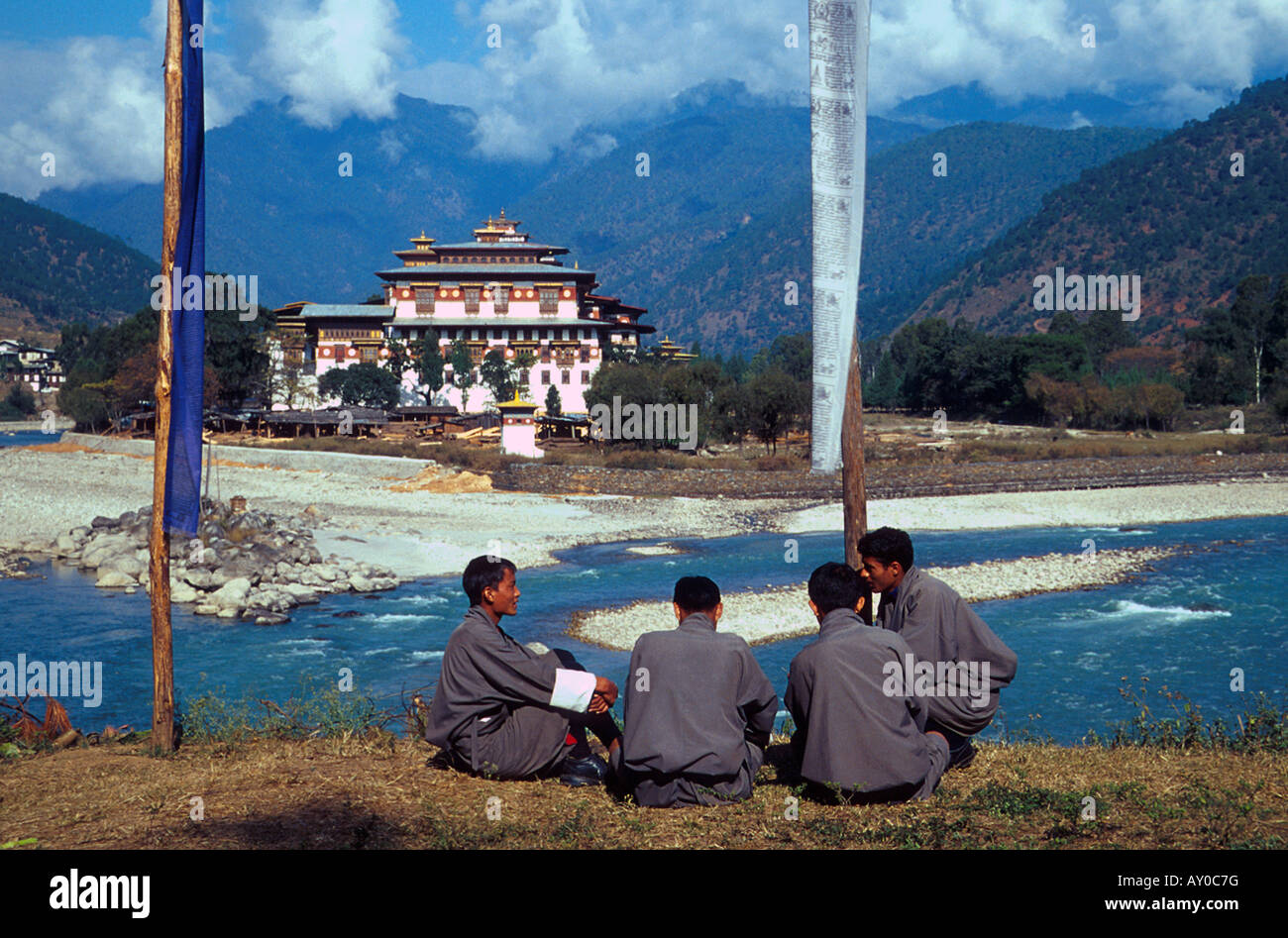 Students with Punahka monastery in background Stock Photo