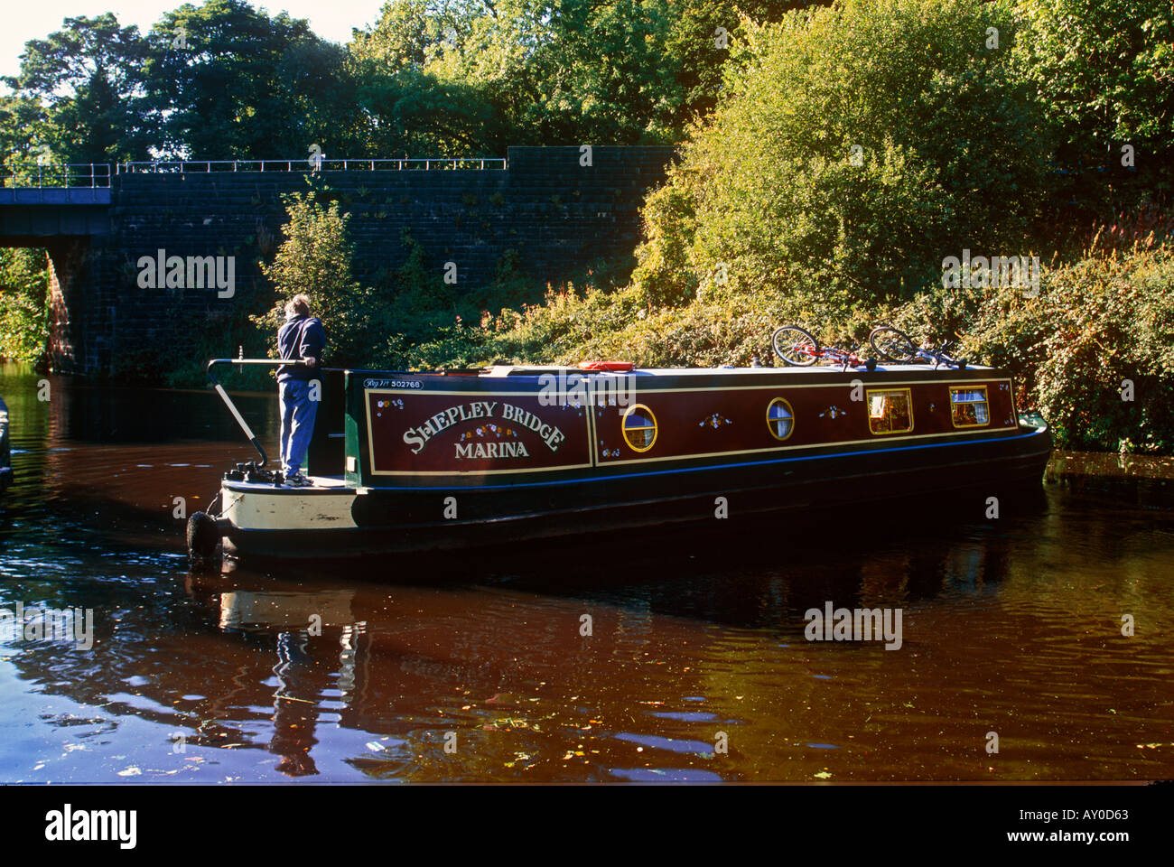 Steering canal boat hi-res stock photography and images - Alamy