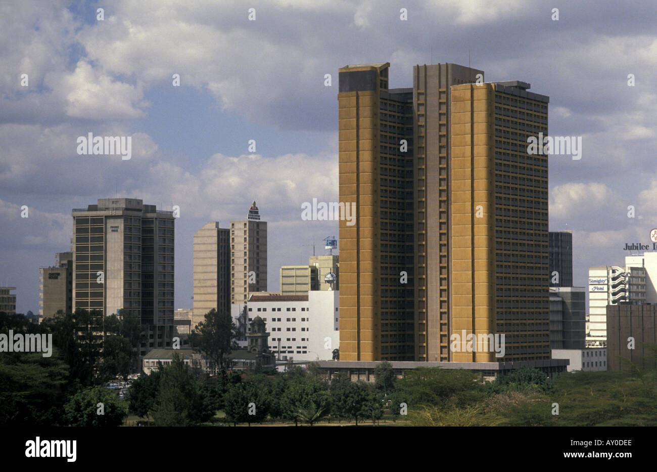 High rise buildings including Nyayo House the tall brown building Nairobi Kenya East Africa Stock Photo