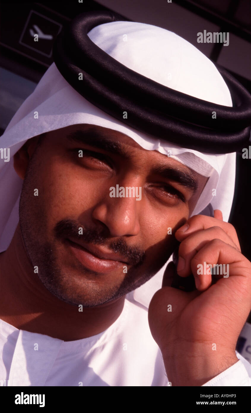 Arab on mobile phone united arab emirates uae Stock Photo Alamy