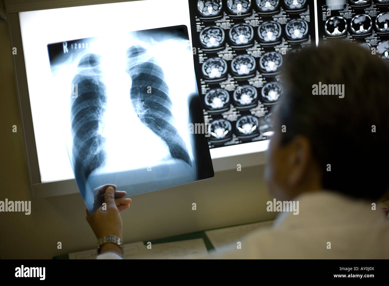 Rear view asian male doctor hi-res stock photography and images - Alamy