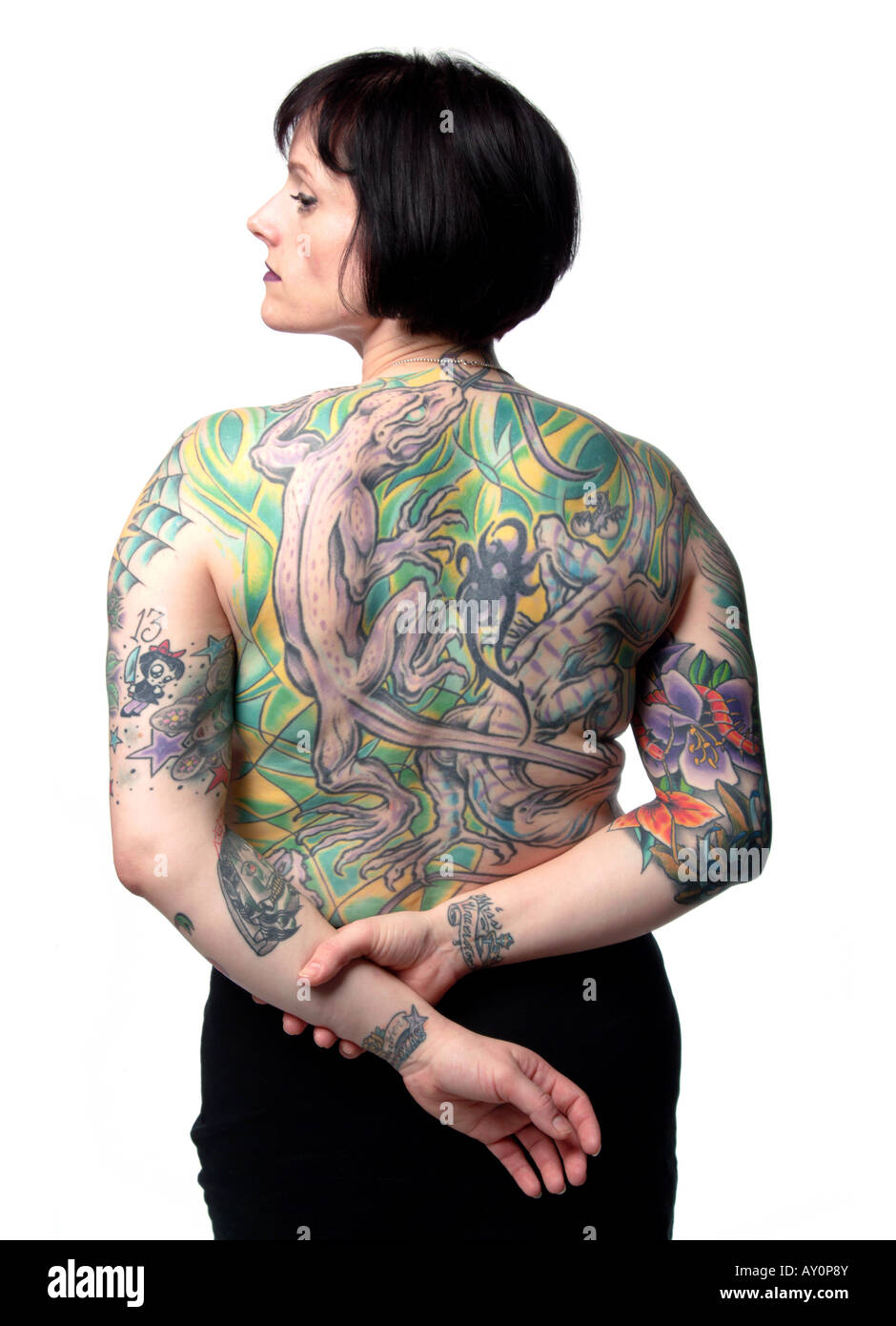 Heavily tattooed woman's back. Stock Photo