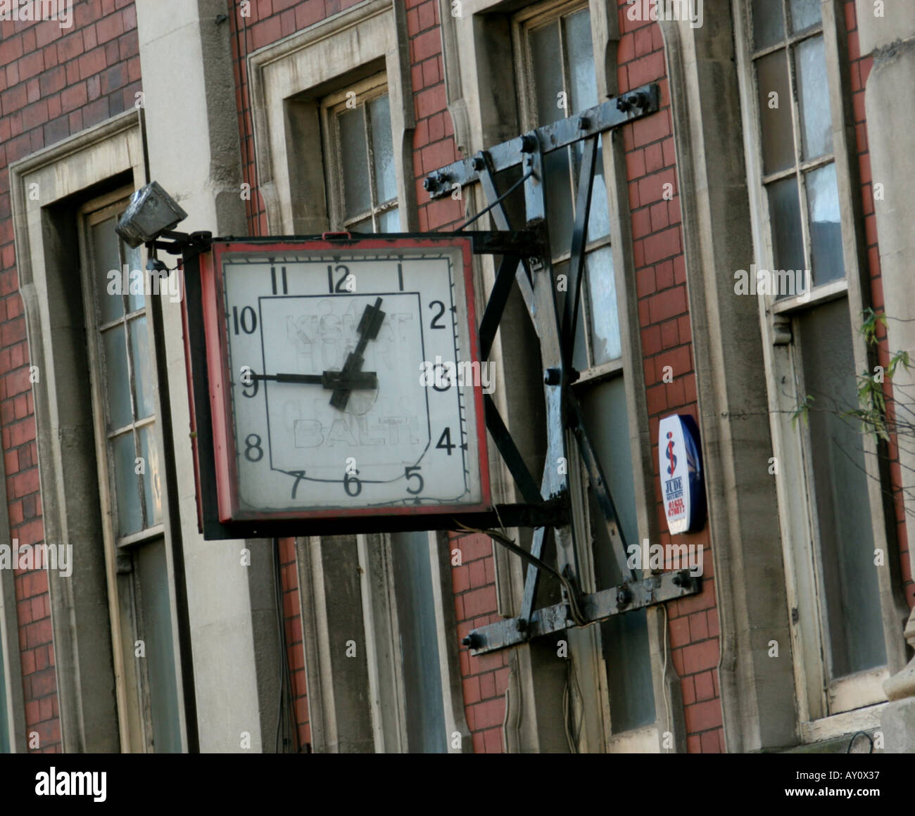 Clock on wall in Clarence Place Newport South Wales UK 2005 Stock Photo