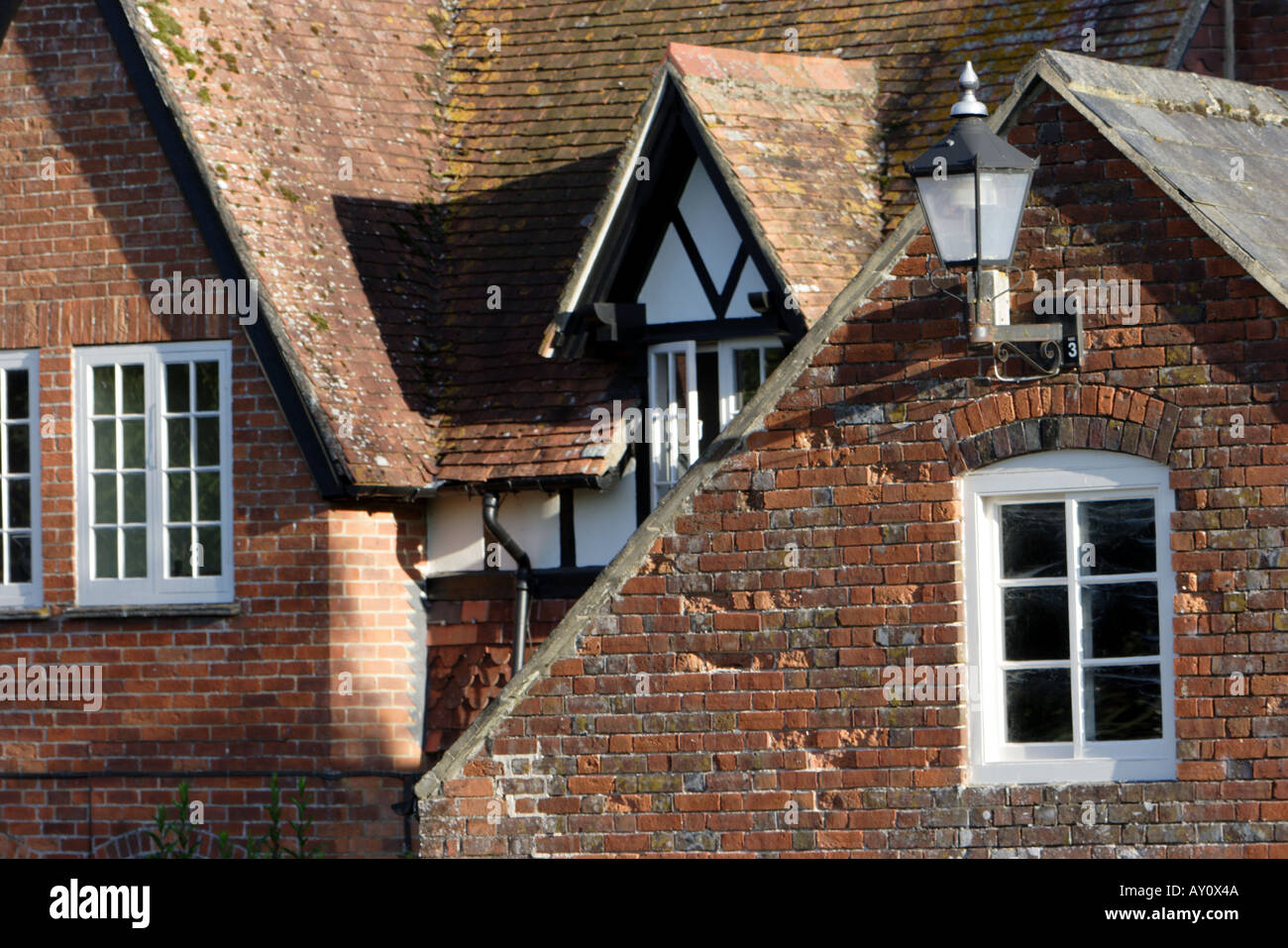 Red Brick Houses With Dormer Windows Gable Ends And A Lantern