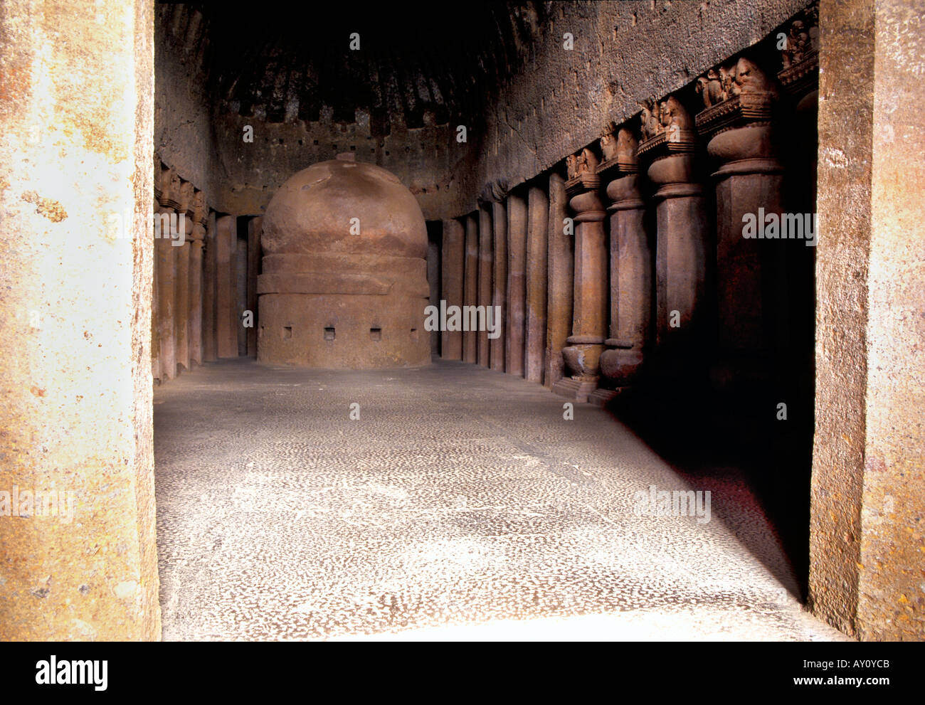 Cave hall with support pillars and Dagoba, a kind of Buddhist shrine.  Sanjay Gandhi National Park, Borivali, Maharastra, India Stock Photo