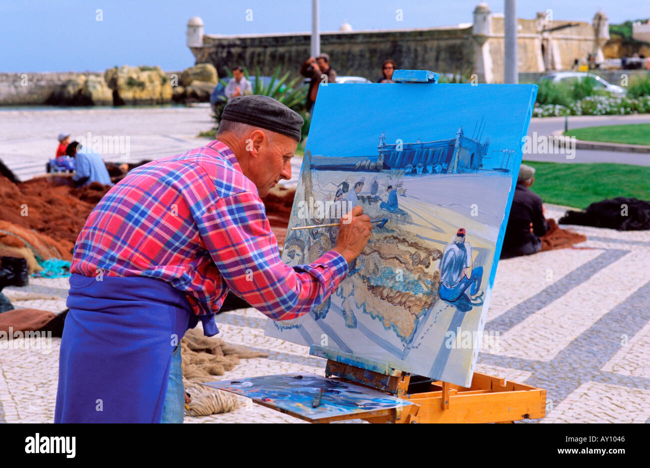 Painter near Fortress Pau da Bandeira Cais da Solaria Lagos Algarve Portugal Stock Photo