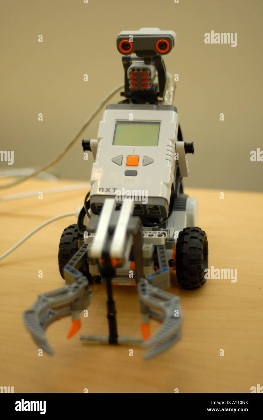 Robot connected to computer on school table Stock Photo - Alamy