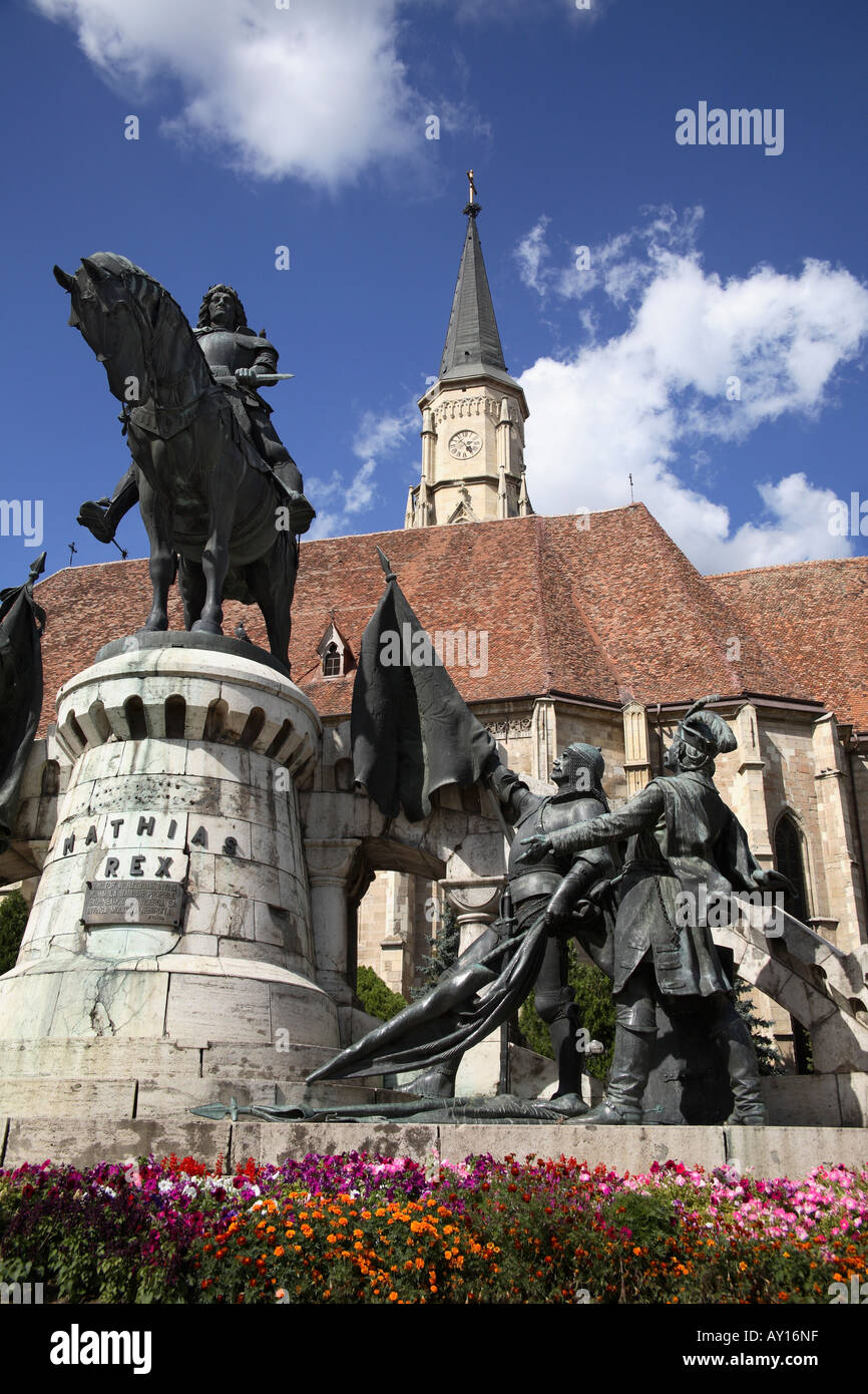 Statue of Matthias Corvinus and Catholic Church. Unirii Square, Cluj- Napoca, Transylvania, Romania Stock Photo