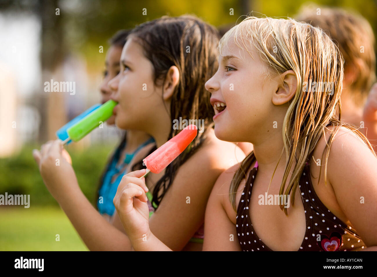 Girls eating flavored ice Stock Photo