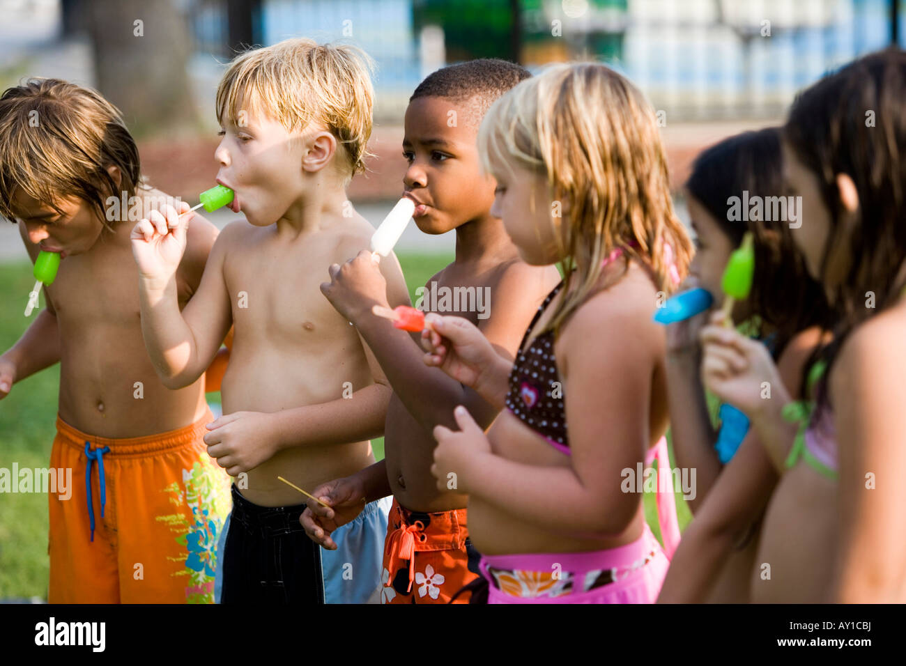 Children eating flavored ice Stock Photo