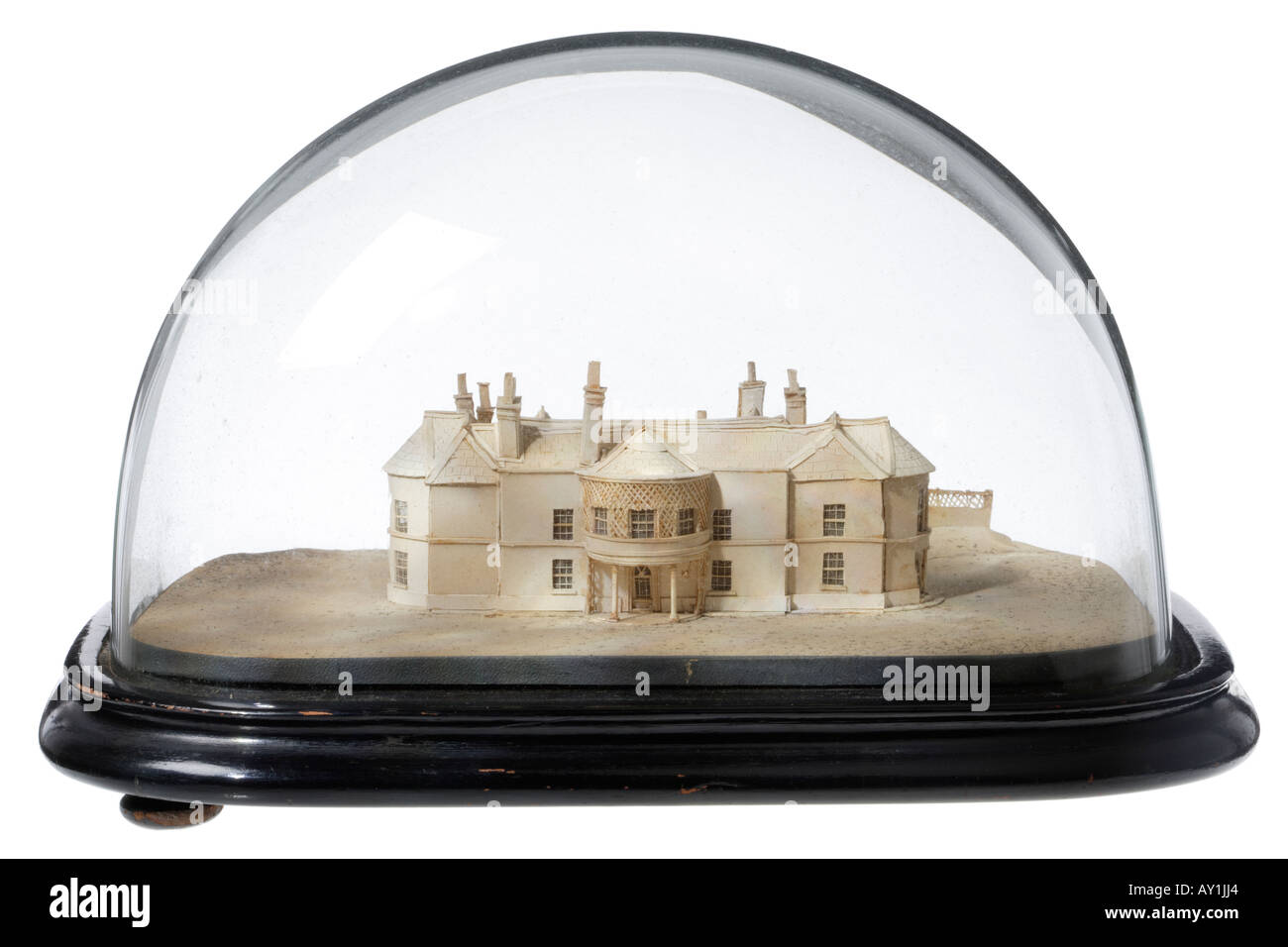 Victorian model of an English house under a glass dome Stock Photo