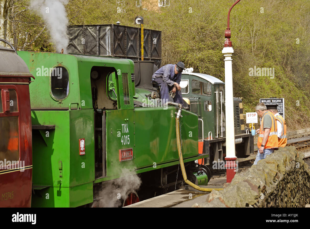 Steam refilling water hires stock photography and images