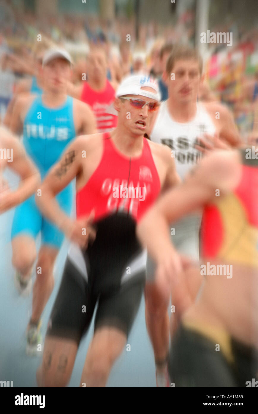 Triathlon Racers Triathlon runners in a race Stock Photo - Alamy