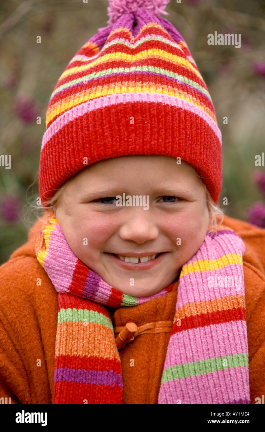 Girl with a winterhat  shrivering with cold Stock Photo