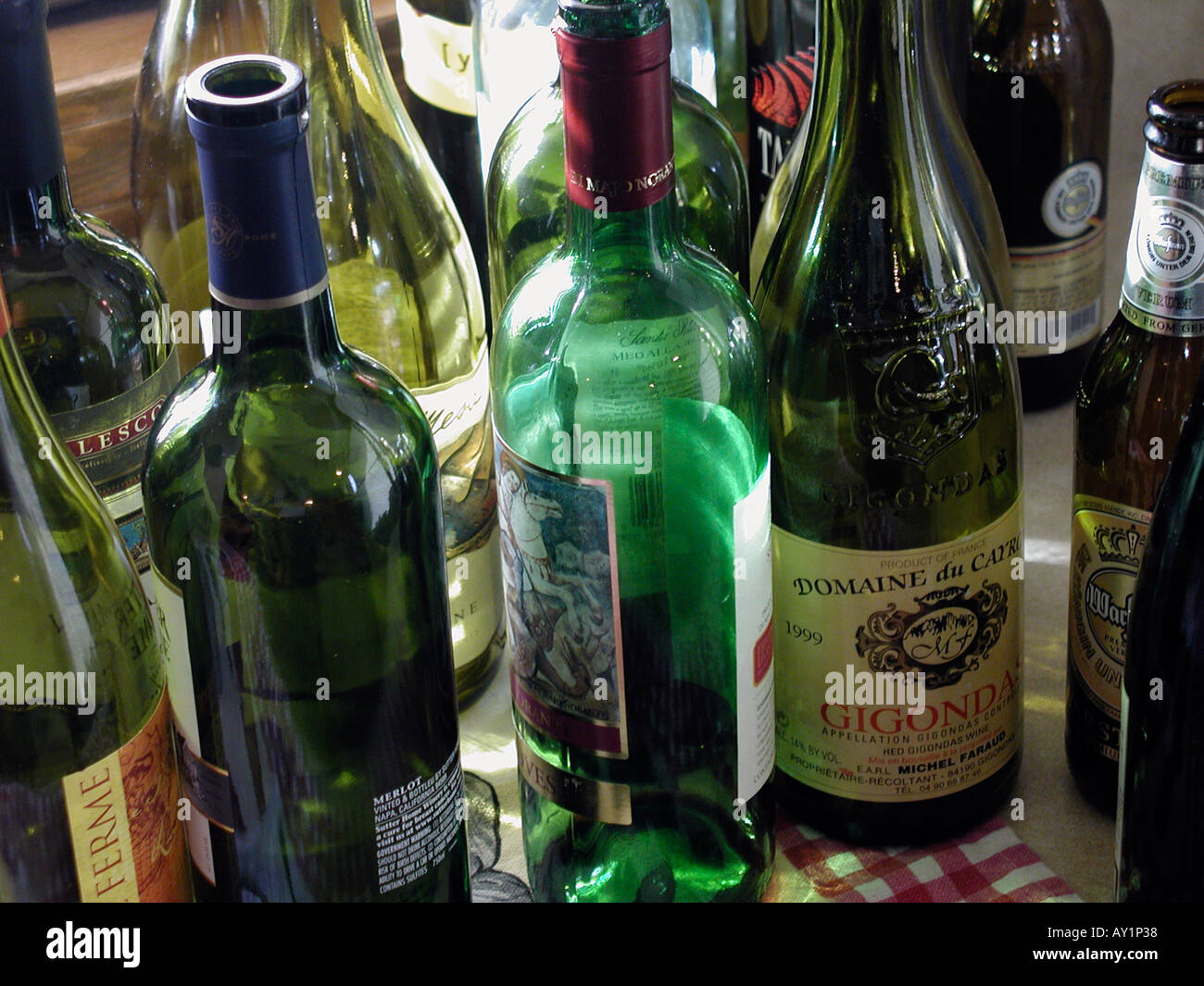 Empty wine bottles gathered up after a party Stock Photo