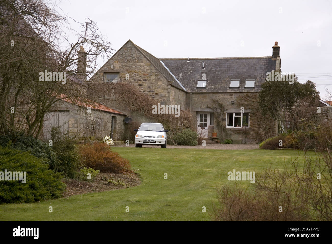 Traditional stone farm cottage,Glanton, Northumberland, England Stock