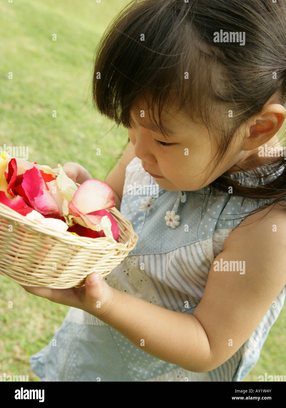 Child smelling side view hi-res stock photography and images - Alamy