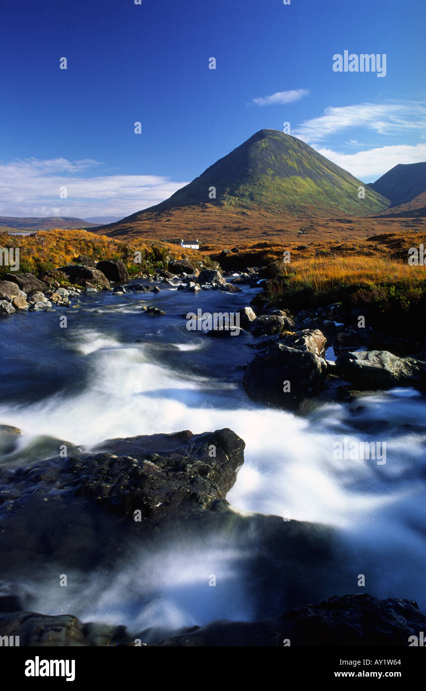 Allt Dearg Mor river leading to Alltdearg House with Sgurr Mhairi hill in the background on the Isle of Skye Scotland UK Stock Photo