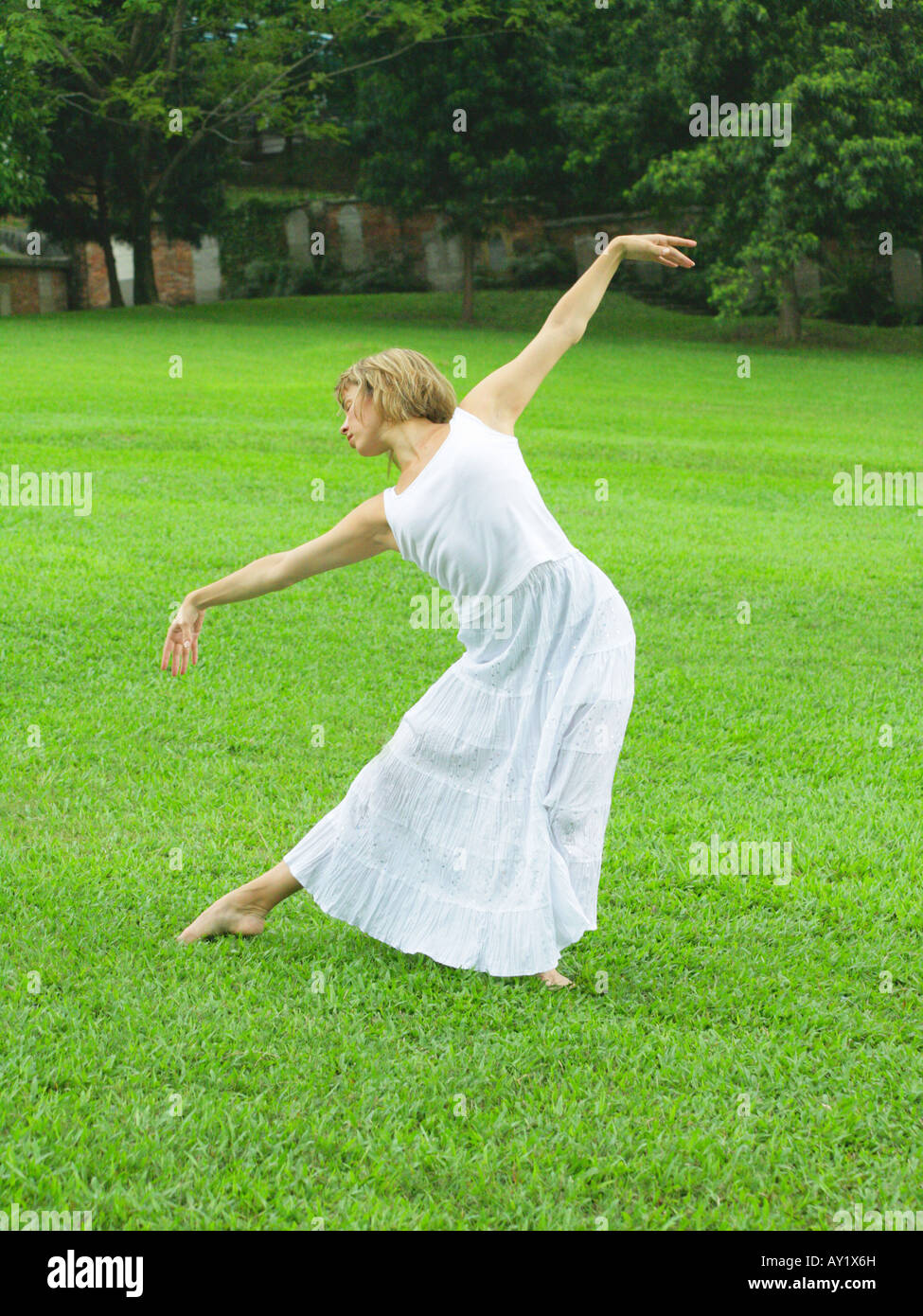 Barefoot dancing grass hi-res stock photography and images - Alamy