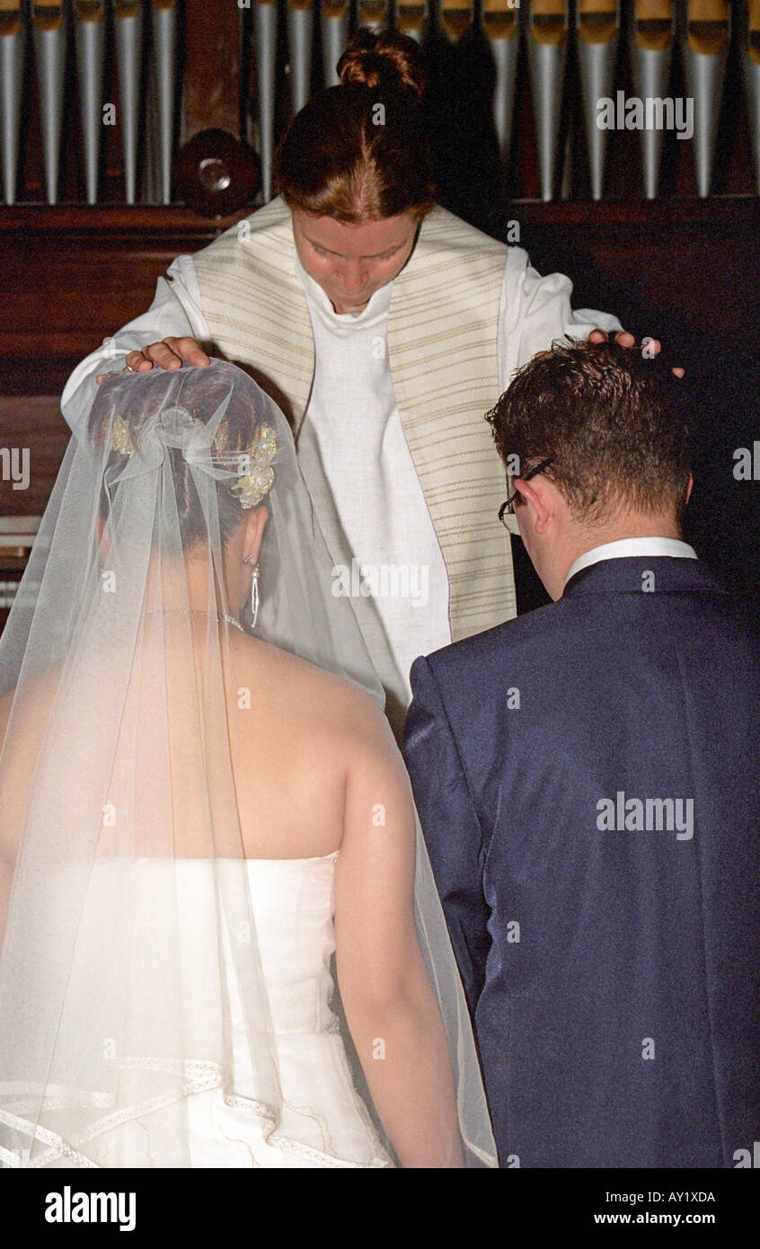 Groom kneeling bride hi-res stock photography and images - Alamy
