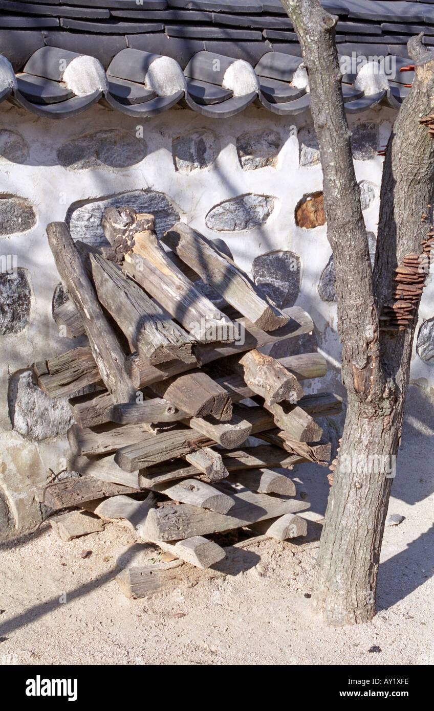Firewood stacked at traditional village in Seoul city South Korea Stock