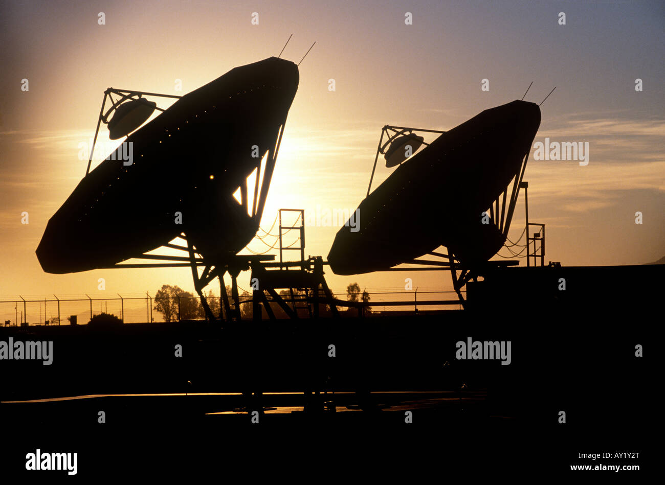 Communications satellite dishes pointing skyward Stock Photo