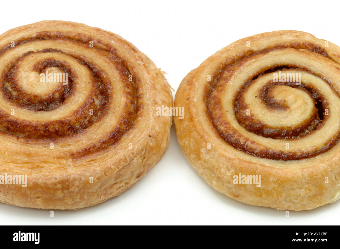 2 two Danish cinnamon whirl pastry on white background Stock Photo Alamy
