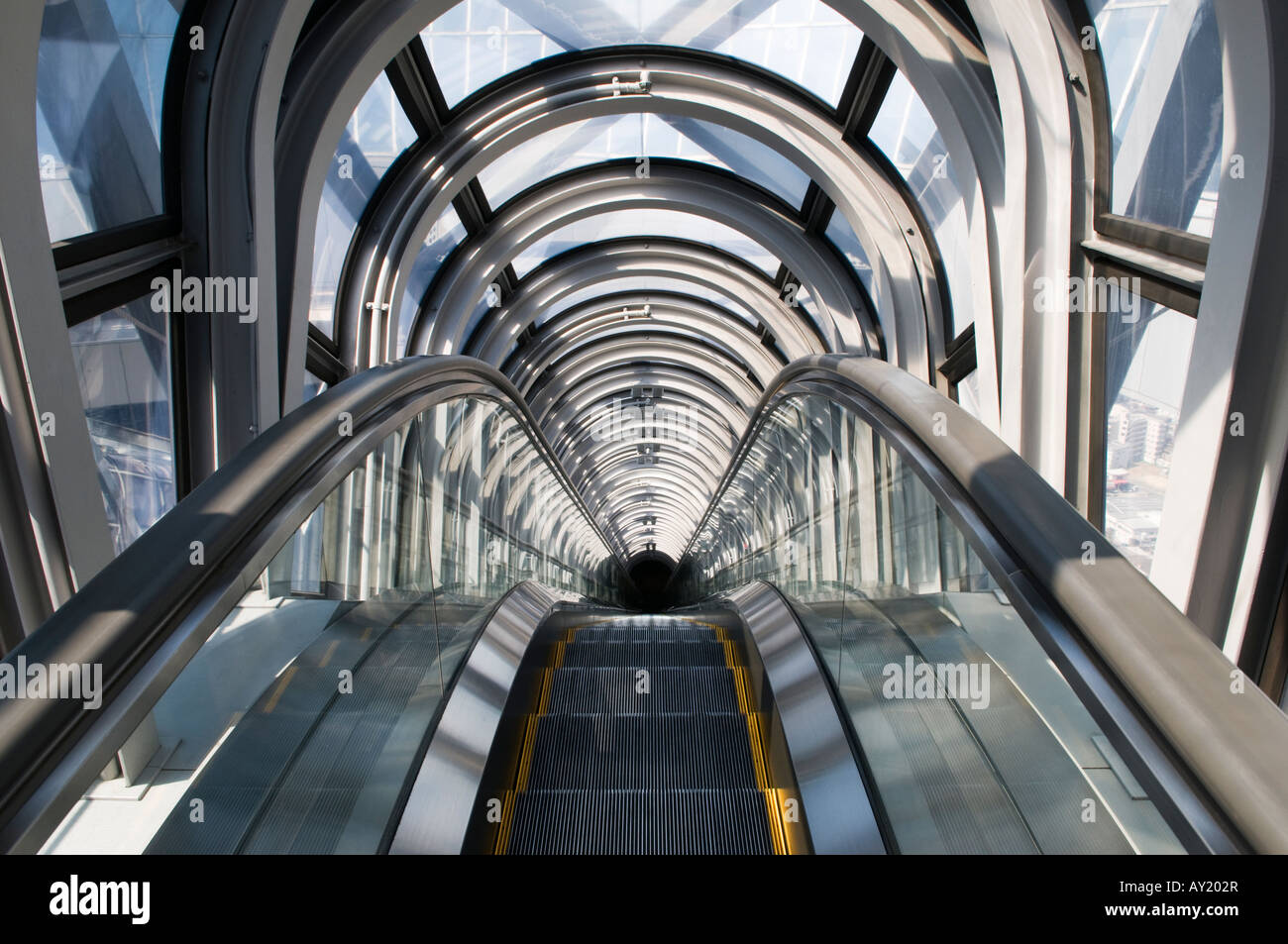 "Glass encased escalator at the Umeda Sky Building Osaka Japan Stock
