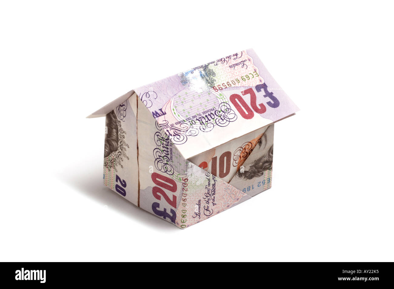 House made of 20 and 10 pound notes Stock Photo