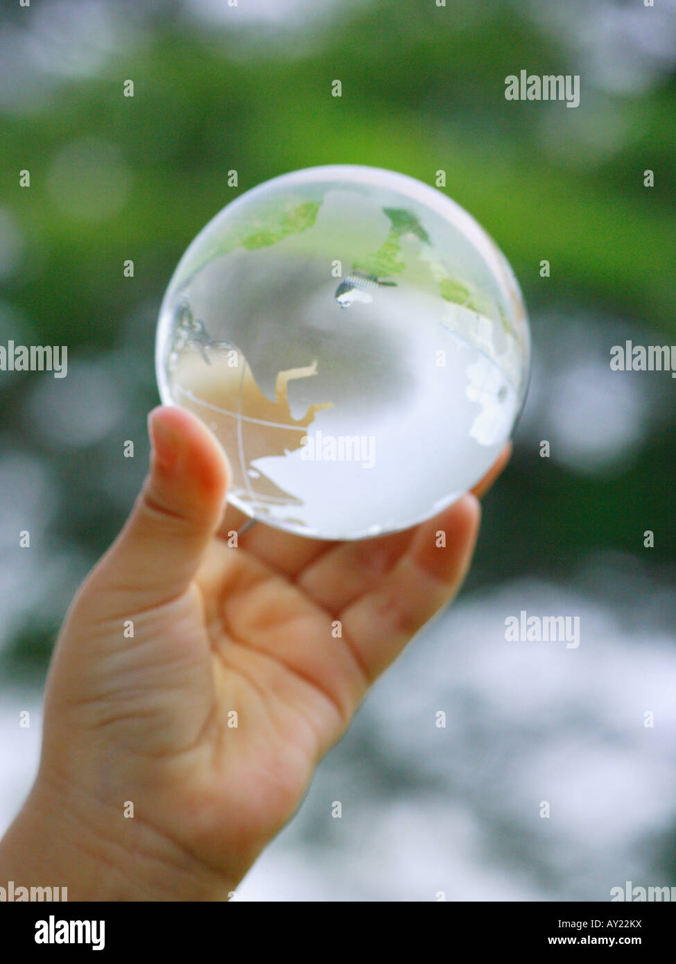 Girls hand holding globe hi-res stock photography and images - Alamy
