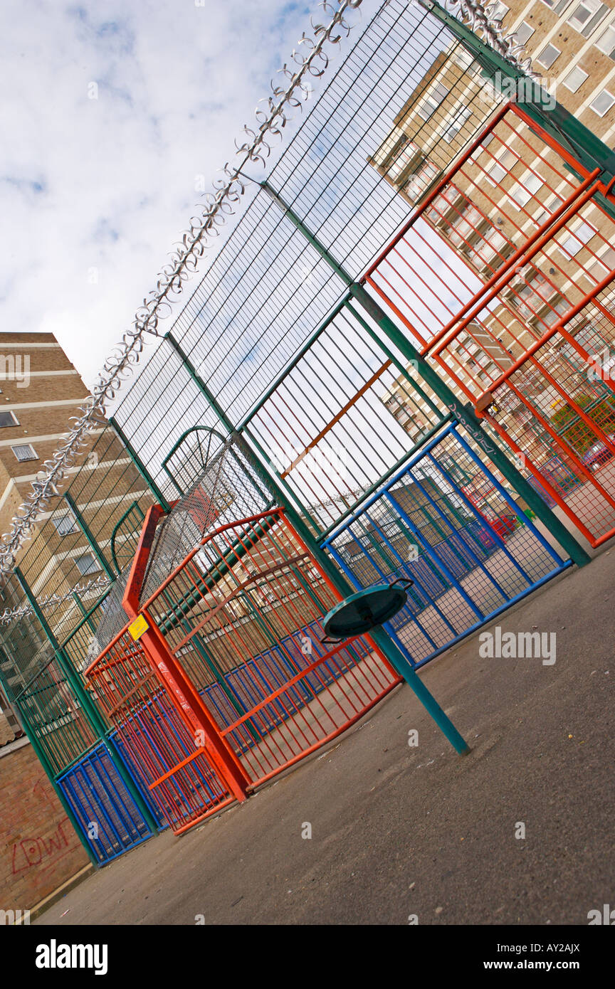 Playground on a council estate with high rise buildings Stock Photo