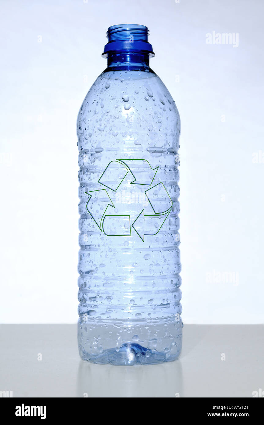 Empty water bottle with recycle symbol over a neutral background Stock