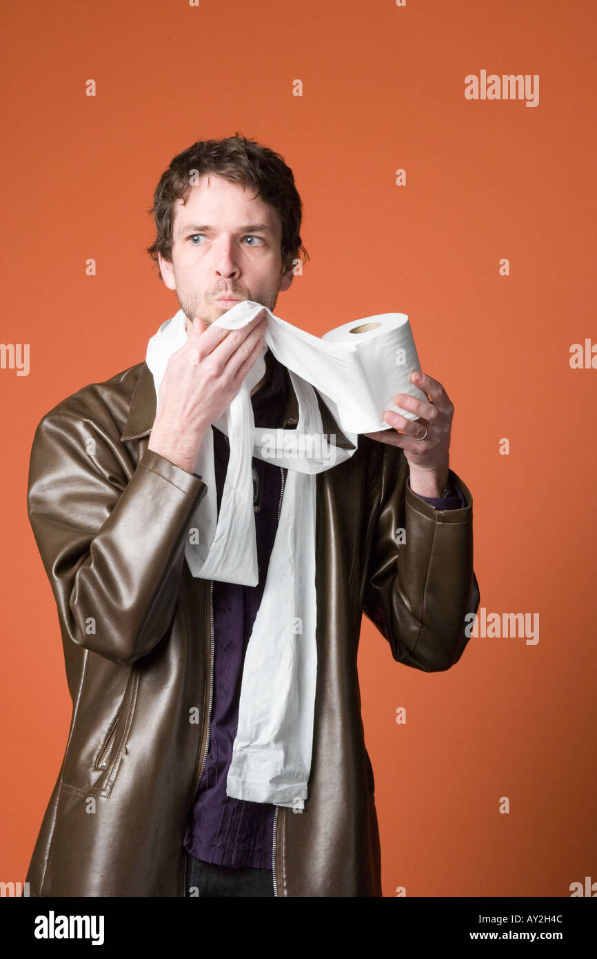 Portrait Caucasian man wrapped in toilet paper Stock Photo - Alamy